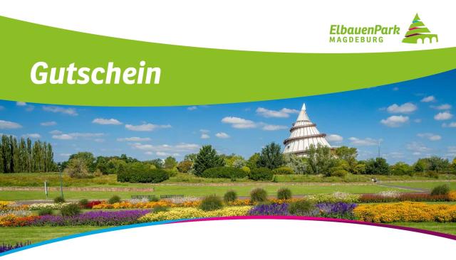 Panorama mit bunten Blumenfeldern im Vordergrund und dem Jahrtausendturm im Hintergrund
